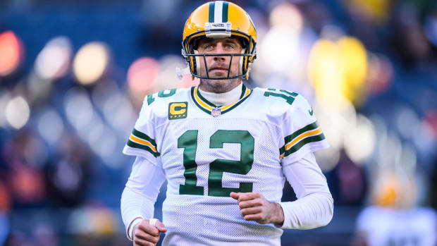 Aaron Rodgers runs